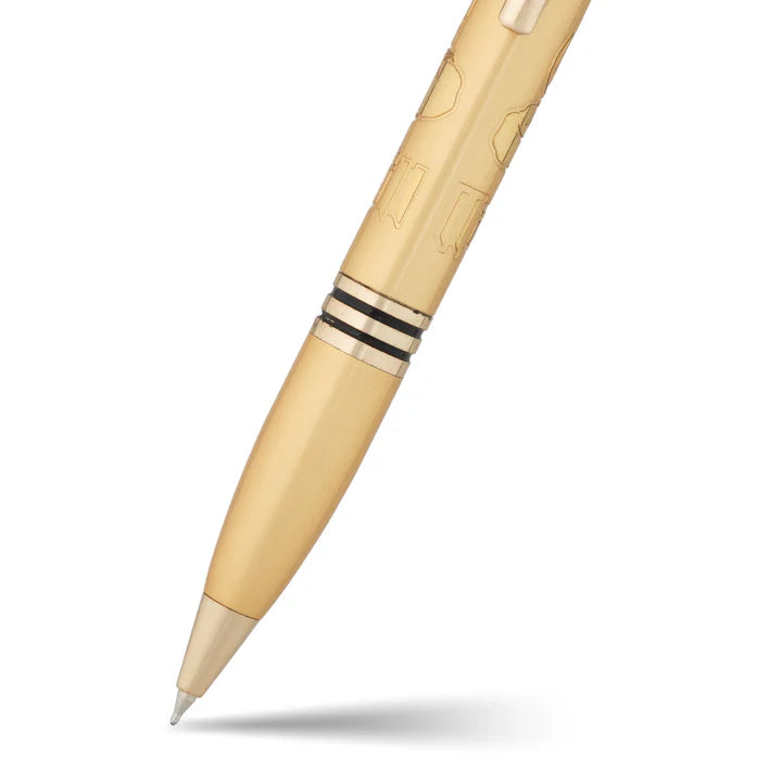 Gold pen with a detailed design on a white background
