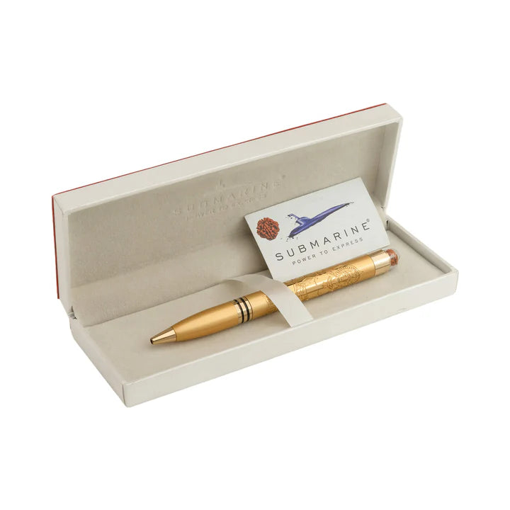 Gold pen in an open box with a card inside, on a white background