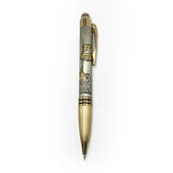 Decorative pen with gold and silver design on a white background