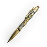 Decorative pen with intricate design on a white background
