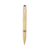Gold pen on a white background