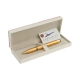 Gold pen in a box with a card inside, on a white background