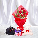 Roses and Chocolate Gift Arrangement with 6 red roses bouquet, chocolate truffle cake, Cadbury chocolates, and white teddy bear. Ideal for Valentine’s Day or romantic gifting.
