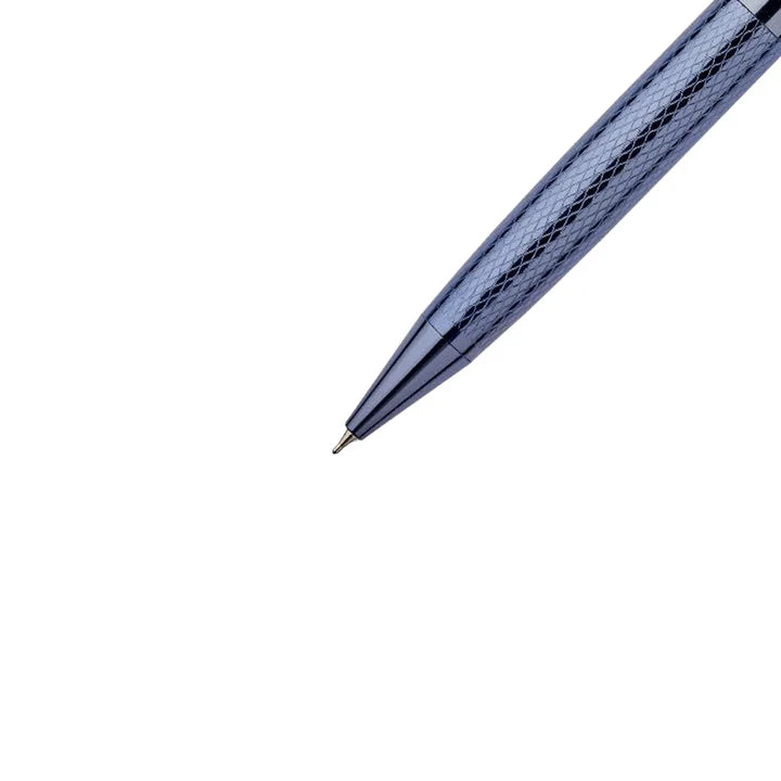 Close-up of a blue pen on a white background