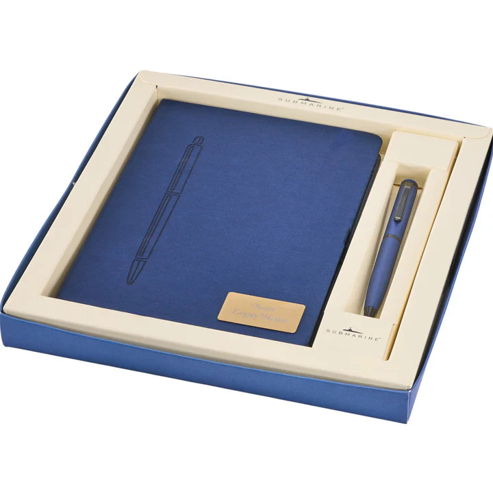 Blue notebook and pen set in a decorative box