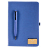 Blue notebook with a pen on a white background