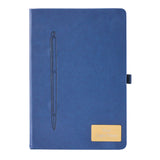 Blue notebook with a pen embossed on the cover and a gold tag on a white background