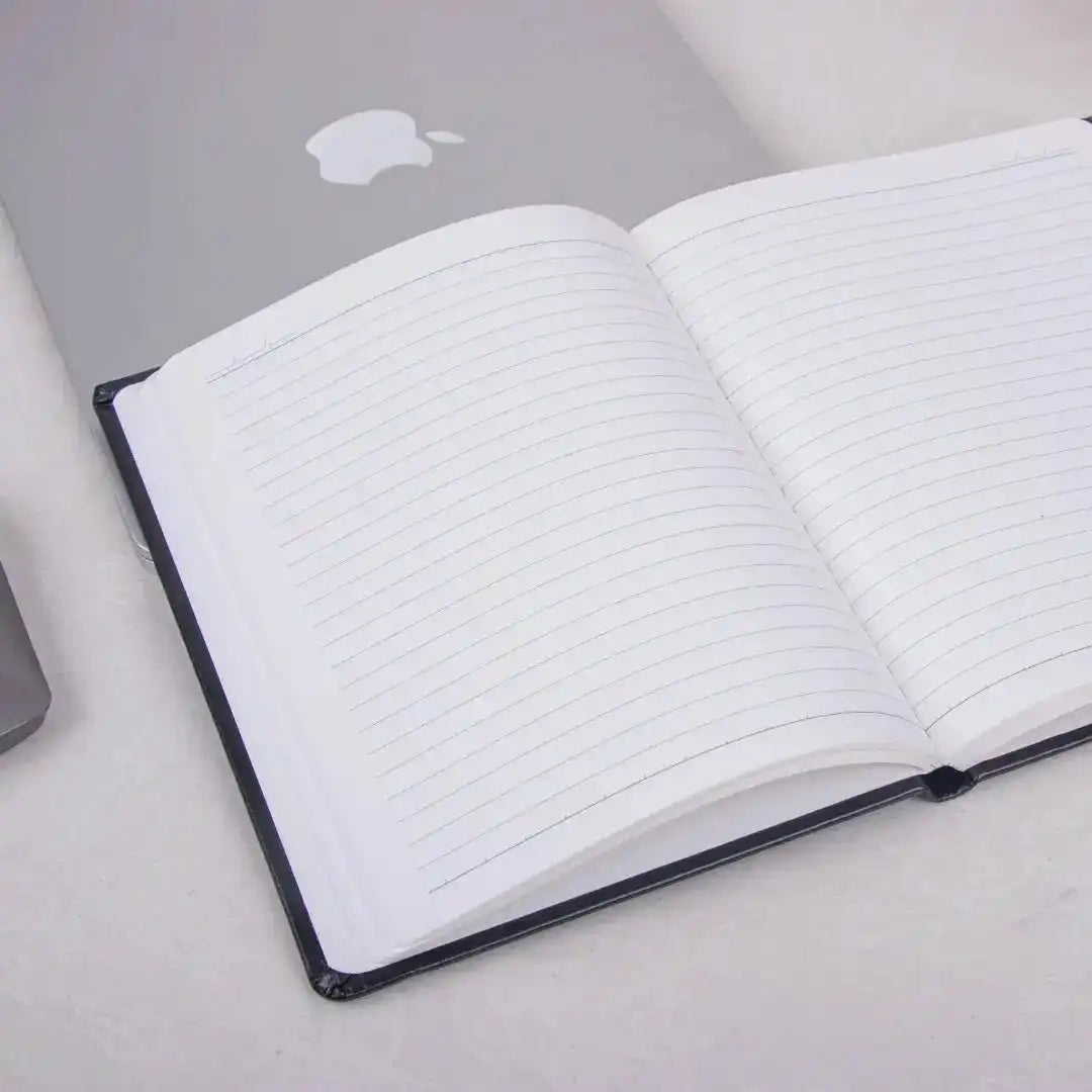 Black Fluct A5 Diary open to reveal lined pages, ideal for notes and journaling.