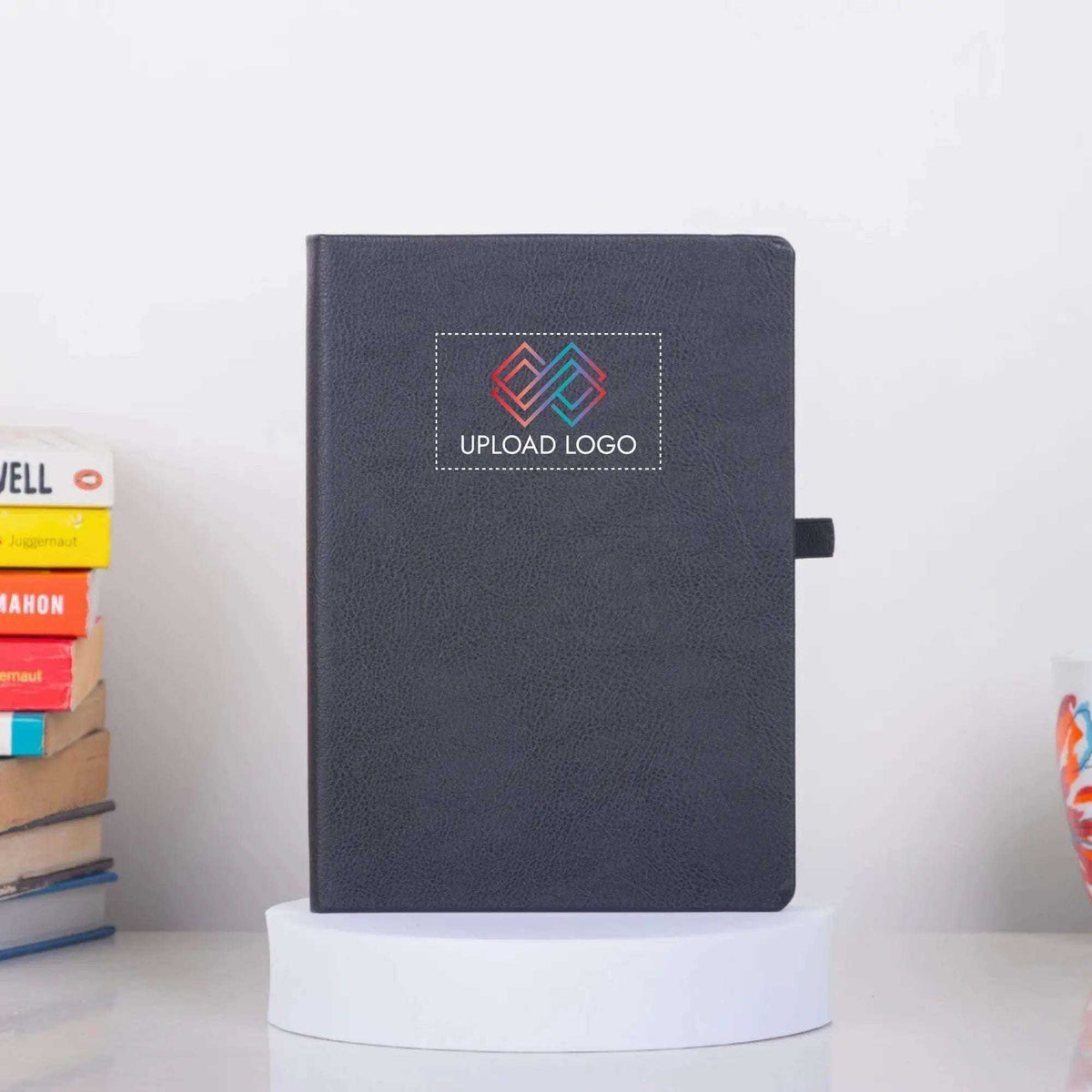 Black Primo A5 Diary with customizable logo area, ideal for corporate gifts and productivity planning with 192 pages and pen-loop feature.