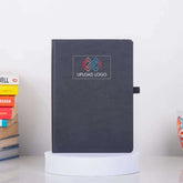 Black Primo A5 Diary with customizable logo area, ideal for corporate gifts and productivity planning with 192 pages and pen-loop feature.
