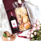 Delicious assortment of holiday indulgences in the Santa’s Brunch Affair corporate gift basket