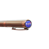 Copper pen with NASA logo on a white background