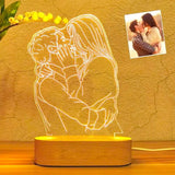 Custom LED hologram lamp with engraved couple photo, glowing warm light and wooden base. Great for engagements, Hug Day, or romantic decor.