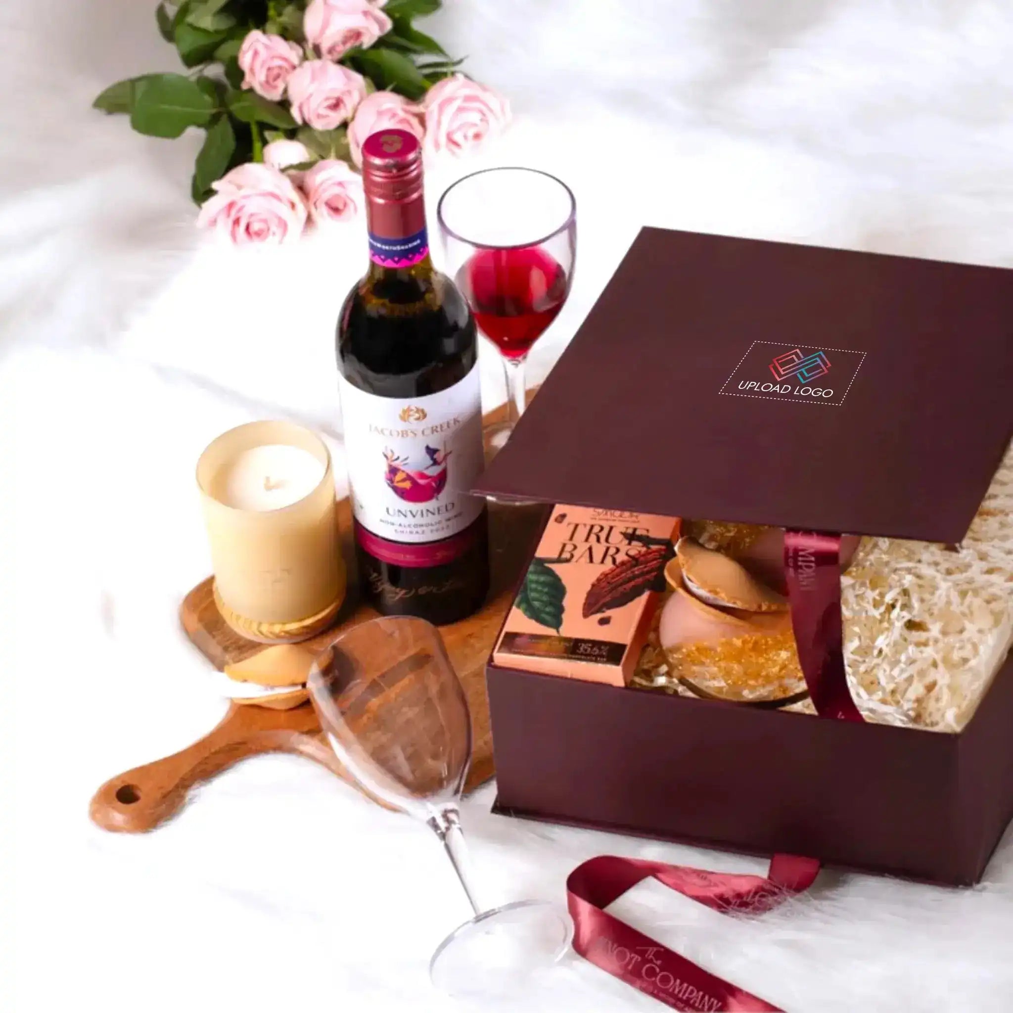 Festive corporate gift basket with premium chocolates, savory snacks, and seasonal beverages
