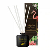 Scent diffuser with white sticks and black container, featuring 'Midnight Rose' branding.