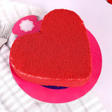 Love Expression Red Velvet Cake in heart shape, perfect for Valentine's Day or special occasions, available for quick delivery.