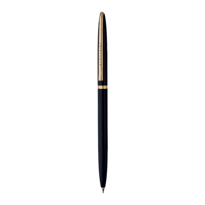 Black pen with gold accents on a white background