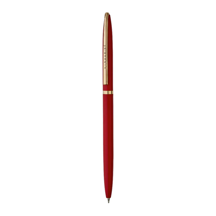 Red pen with gold accents on a white background