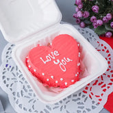 Love You Mini Vanilla Cake delivery in heart shape, 300g, handcrafted with red frosting and white icing text, ideal for romantic occasions.