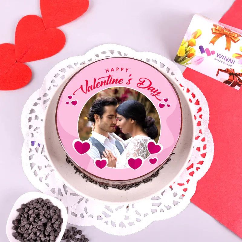 Valentine Special Truffle Photo Treat - Valentine cupcake treat featuring a round chocolate cake with custom romantic photo and heart decorations.