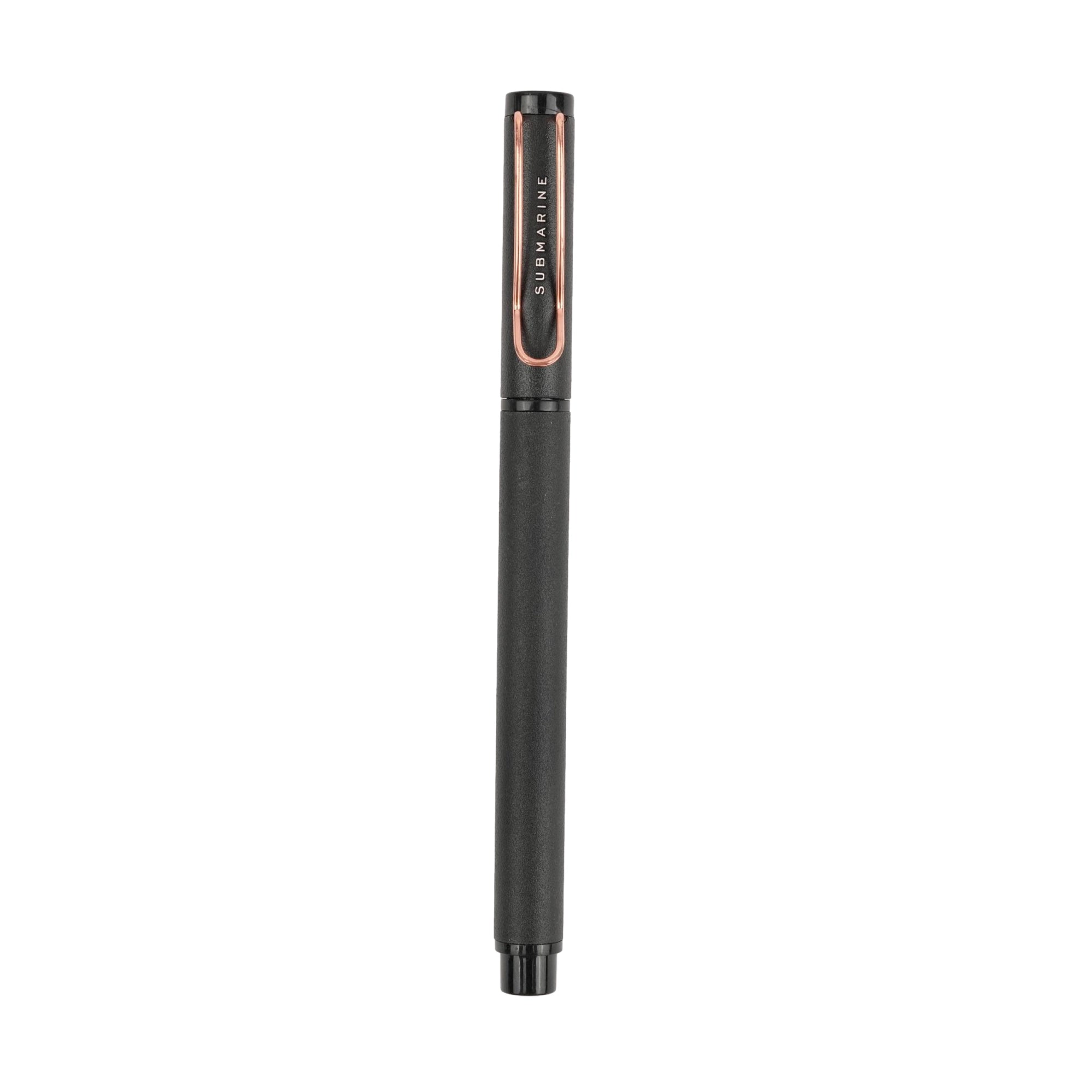 Black pen with rose gold accents on a white background