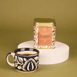Golden Sip Collection features Assam Premium Chai in a designer tin with a ceramic cup, ideal for gourmet Diwali tea gift hampers.