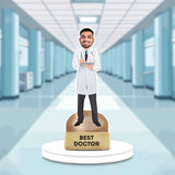 Best Doctor Caricature - Personalized Gift | Doctor Showpiece featuring a smiling male doctor in a white coat holding a clipboard, set in a hospital hallway. Ideal for home decor or gifting medical professionals.