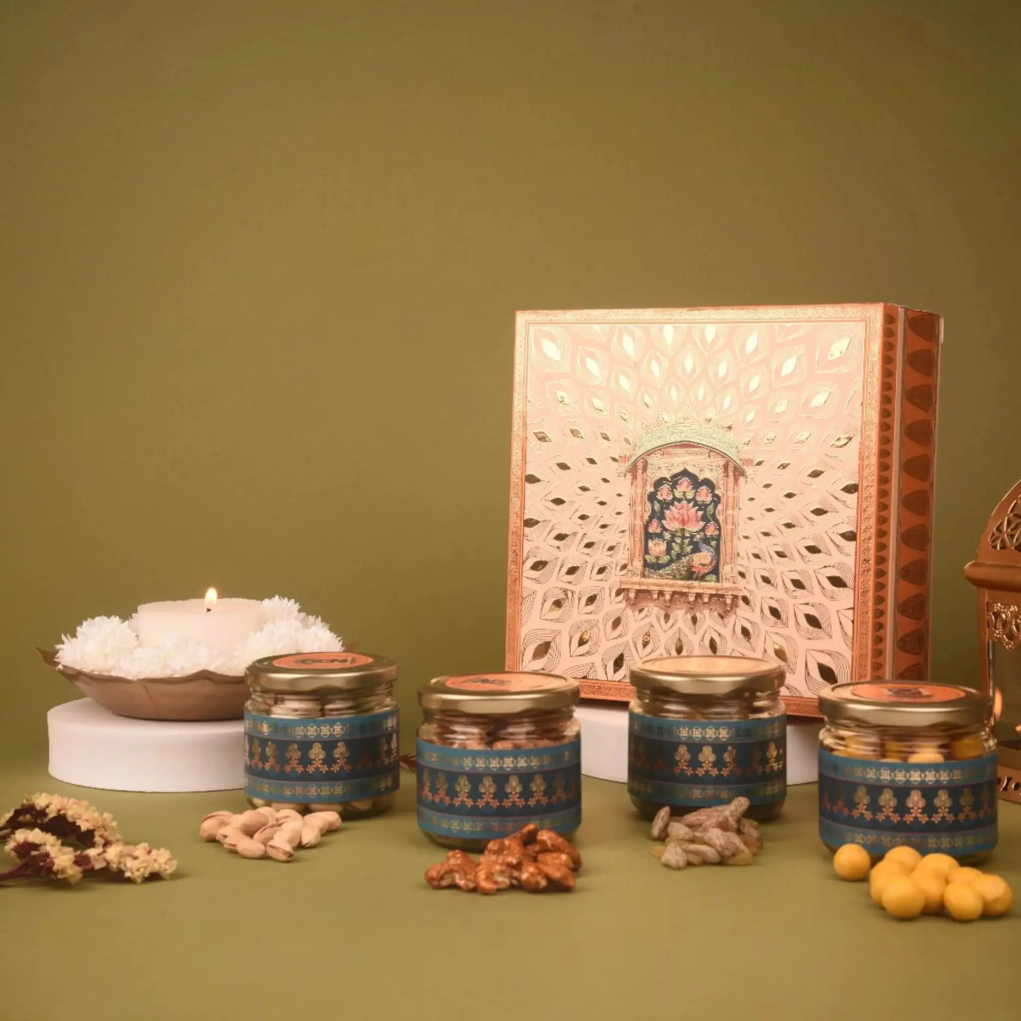 Celestial Radiance Hamper - Nuts & Dragees | Diwali Gift featuring a decorative gift box with jars of dry fruits and sweets, ideal for festive gifting.