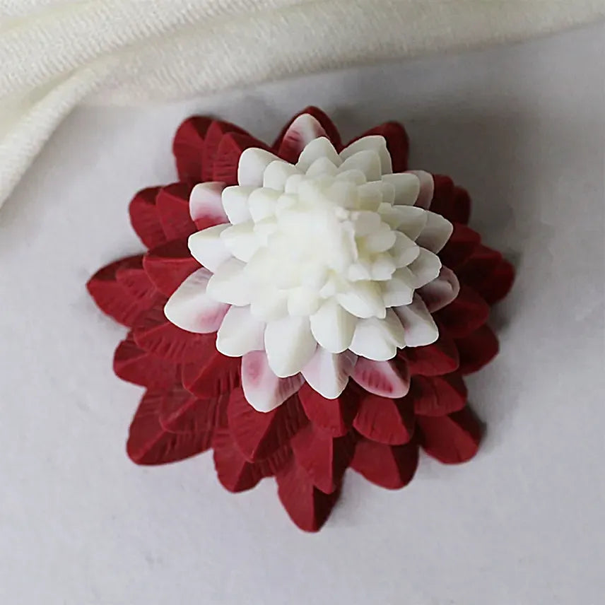 Top view of Christmas Tree Scented Candle showing detailed pine-like layers in red and white, enhancing holiday ambience and décor.