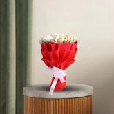 Ferrero Rocher Chocolate Bunch arranged in an elegant bouquet, featuring golden-wrapped chocolates perfect for gifting.