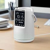 White digital clock with display on a desk