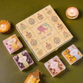 Decorative box with small containers of confectionery on a green background