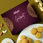 Giftech Global gourmet gift box with cookies and nuts on a green background
