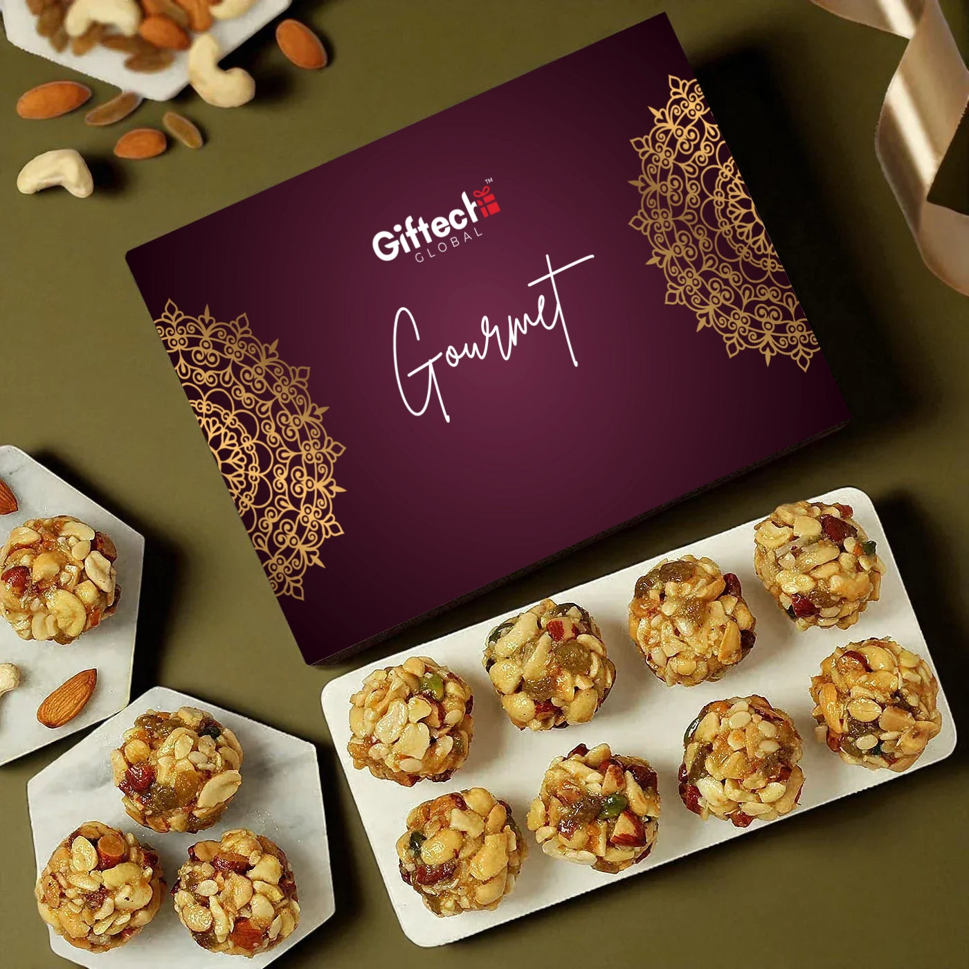 Gourmet snacks on a plate with a 'Giftet' branded box in the background