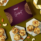Gifteeh gourmet gift box with assorted nut cookies on a green background