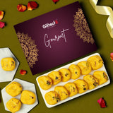 Giftect Global Gourmet box with yellow pastries on a green background