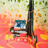 Personalized Spotify keychain featuring a custom image and scannable song code, perfect for gifting music lovers.