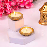 Elegant floral metal candle set with intricate design, perfect for Diwali gifts and stylish home decor