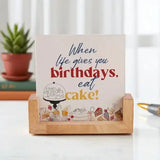 Birthday Joy Frame - Personalized Gift with quote 'When life gives you birthdays, eat cake!' in a wooden holder, ideal for home decor.