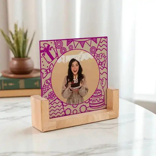 Personalized Pink Celebration Frame with birthday-themed graphics and wooden holder, great for showcasing joyful birthday moments at home.