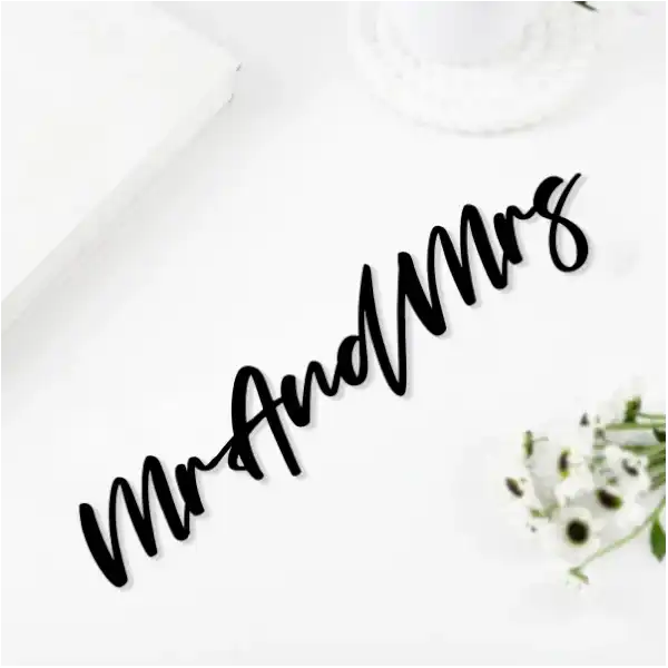 Black acrylic 'Mr. And Mrs' wall decor accent from the Personalized Wedding Frame Set, stylish addition to wedding or anniversary home decor.