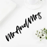 Black acrylic 'Mr. And Mrs' wall decor accent from the Personalized Wedding Frame Set, stylish addition to wedding or anniversary home decor.