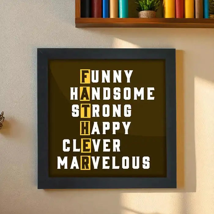 Father's Day gift frame with bold typography spelling FATHER using words like Funny, Handsome, Strong in a black wood poster frame.