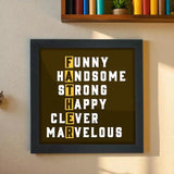 Father's Day gift frame with bold typography spelling FATHER using words like Funny, Handsome, Strong in a black wood poster frame.