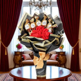 Chocobliss Bouquet Gift with Ferrero Rocher and velvet roses placed in a luxurious room. A premium chocolate bouquet for special occasions.