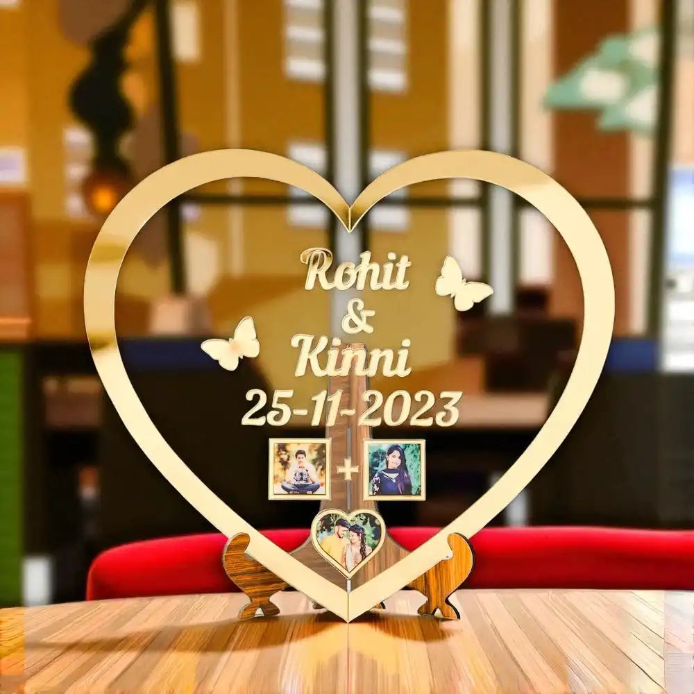 Personalized Heart Shape Golden Frame with custom names and date, ideal for wedding gifts or anniversary decor, featuring photo slots and butterfly accents.