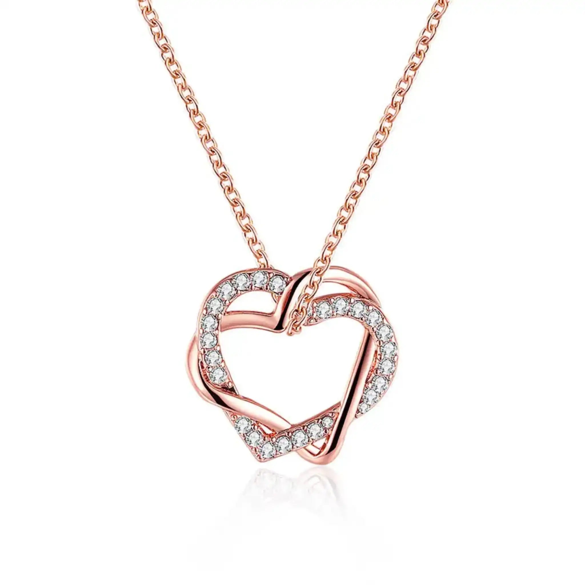 Close-up of rose gold heart pendant with sparkling crystals on fine chain, a durable and stylish gift for anniversaries or birthdays.