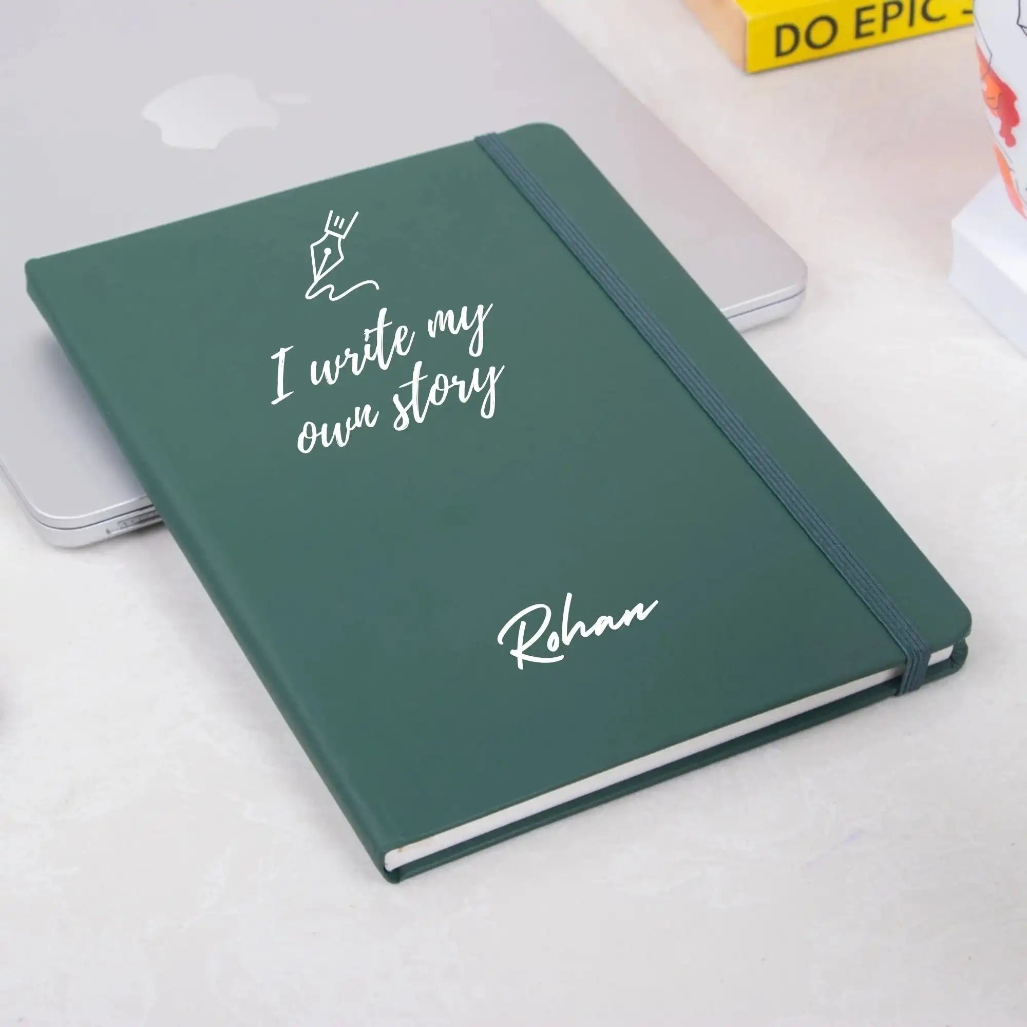 Storyteller’s Journal Personalized Diary in dark green with 'I write my own story' and custom name Rohan, ideal for planning workdays and tracking goals.