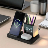 Desk organizer with phone charging station, clock, and pen holder on a desk.