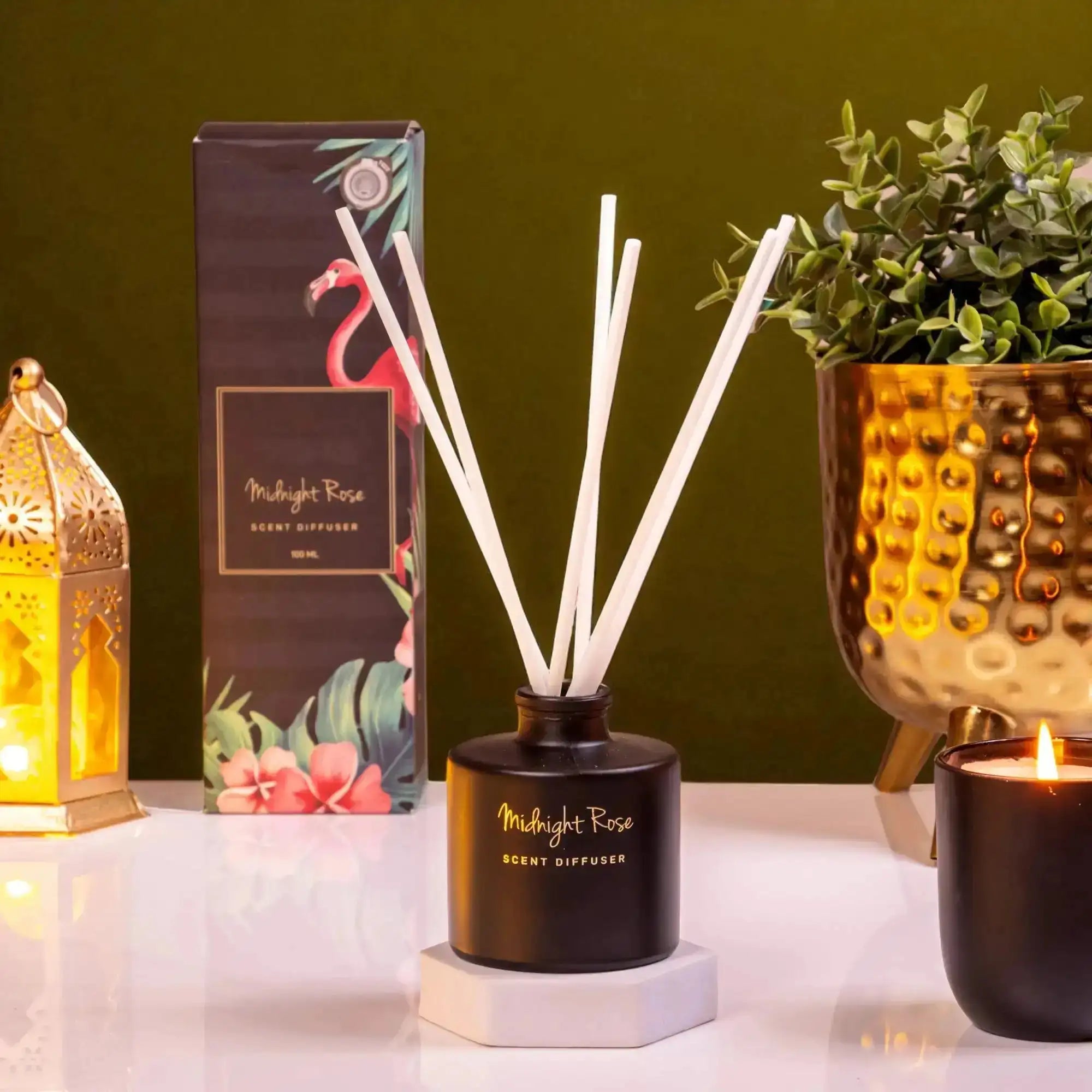 Midnight Rose scent diffuser from Mystic Glow Diwali Gift Hamper with floral packaging and candle. Elegant Diwali gift for employees or loved ones.